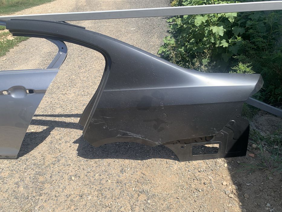 Aripa spate stanga Vw Passat b7 dupa 2011