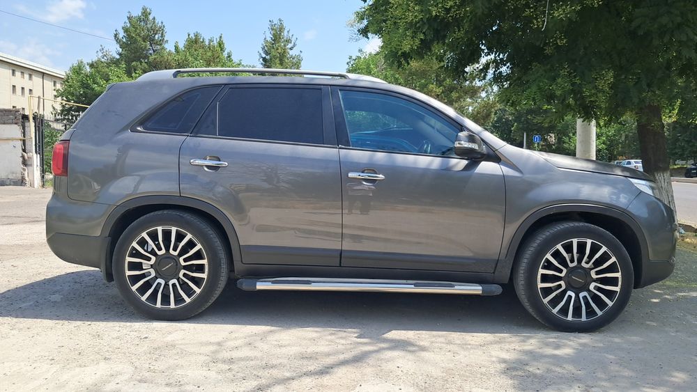 Kia sorento 2013год