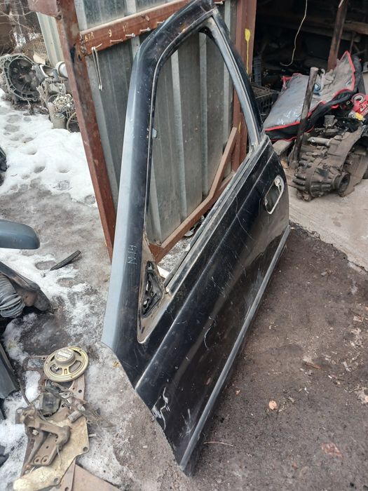 Дверь Нисан сани N14