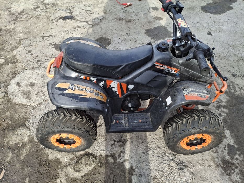 Vând atv  kxd pro .aproape nou 125