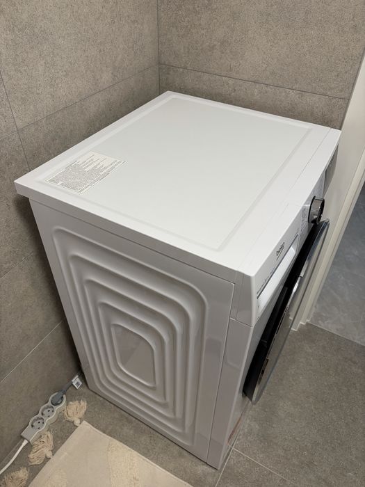 Uscator de rufe Beko