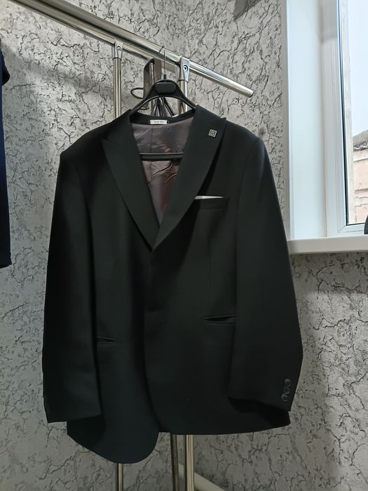 Кастюм брюки новый хороший материал