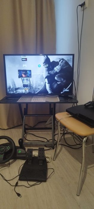 PS 3 modat  + Volan gaming (în garanție);(31 jocuri)   550 roni neg.
