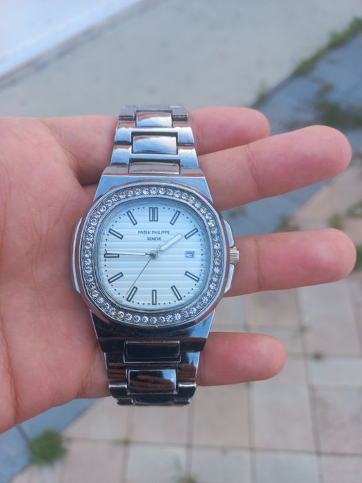 Часы от бренда Patek Philippe