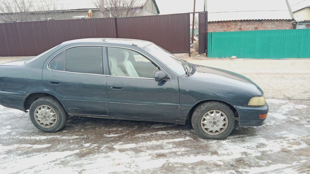 Тайота каролла ае 100