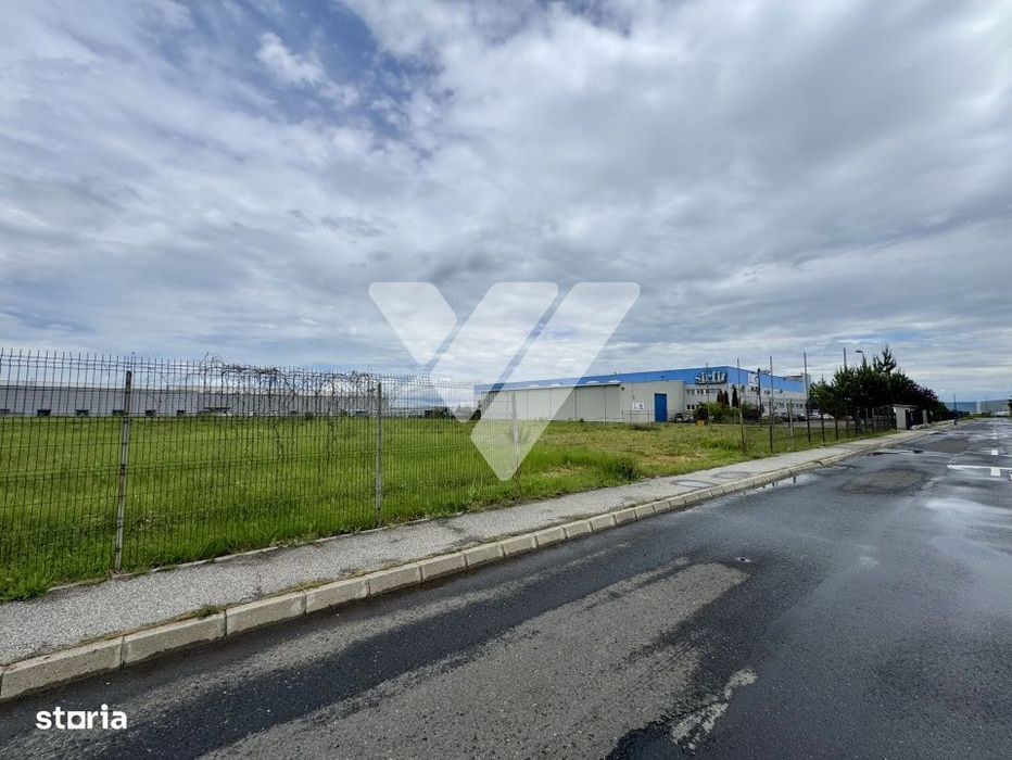 Teren intravilan industrial 11.059 mp, PUZ aprobat, asfalt - zona Vest