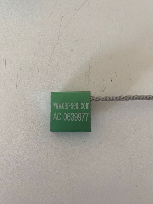 Пломба тросовая (cable seal), номерная, новая
