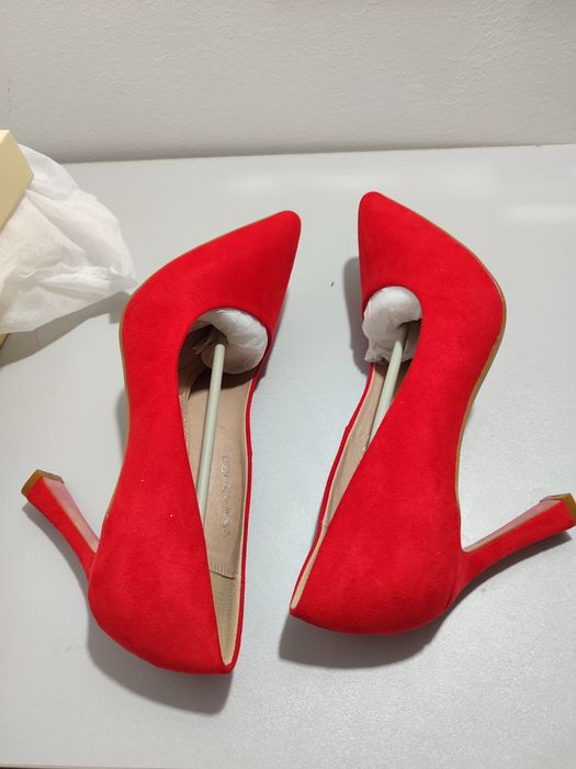 Красные туфли новые