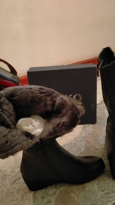 Кожаные сапоги женские