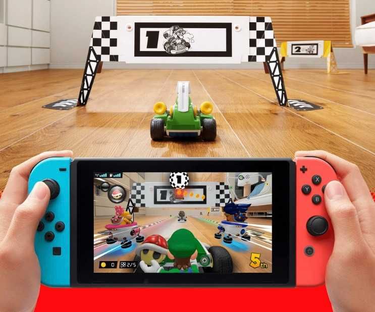 Nintendo Switch Neon Red/Blue + Mario Kart Live Luigi Set + 20 jocuri + accesorii