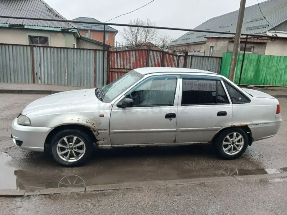 600 000    нексия  1,6 2011ж