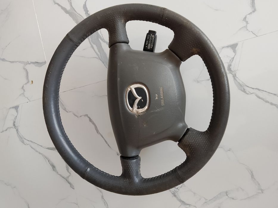 Мазда птичка руль