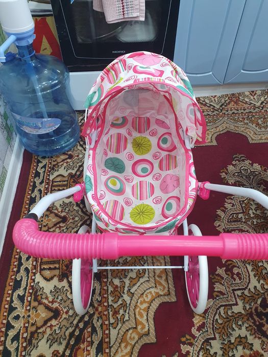 Игрушечная детская коляска