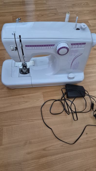 Masina de cusut electrica portabila