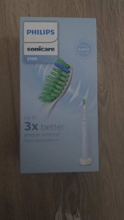 Електрическа четка за зъби Филипс Соникеър 2100 с две глави.