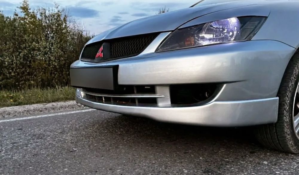 Продам накладки на лансер 9