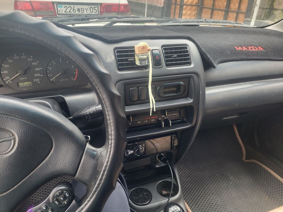 Мазда 323 Фамила