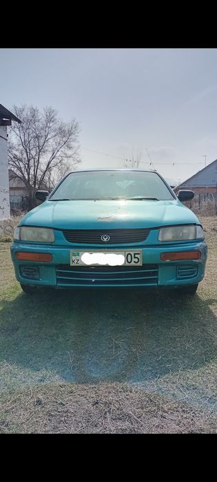 Продам Mazda 323. Седан