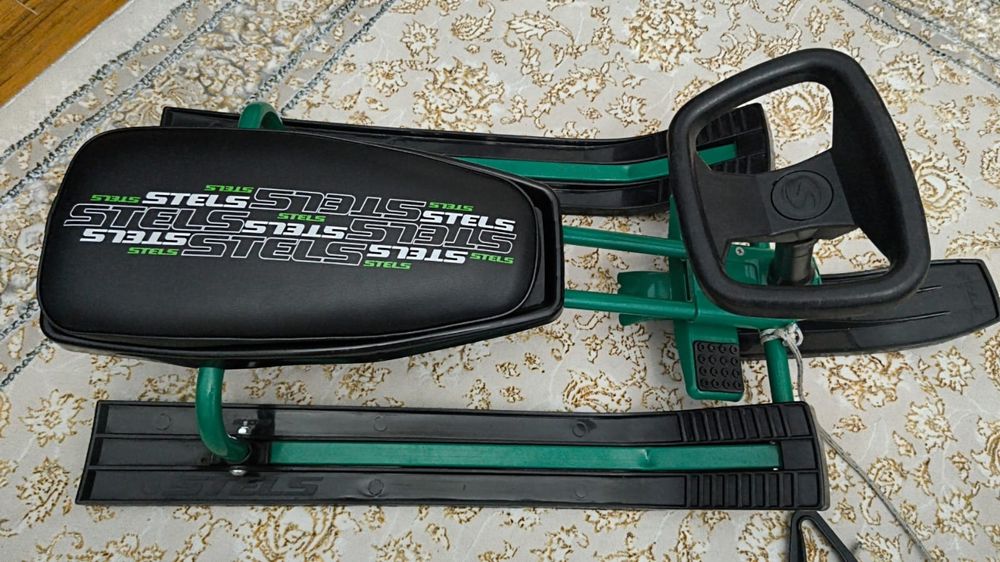 Снегокат Stels Умка