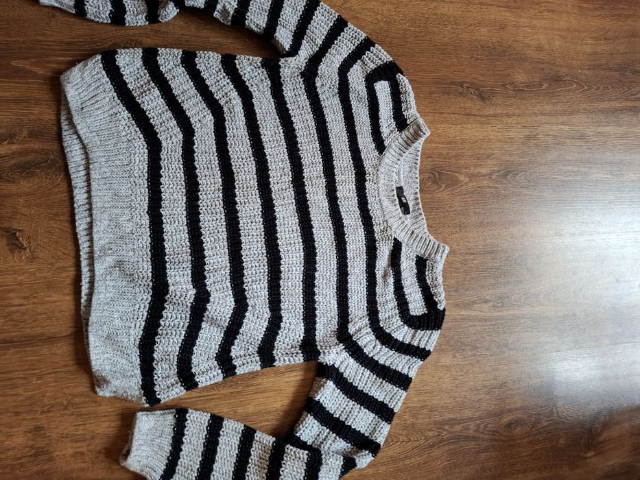 Дамски пуловери .