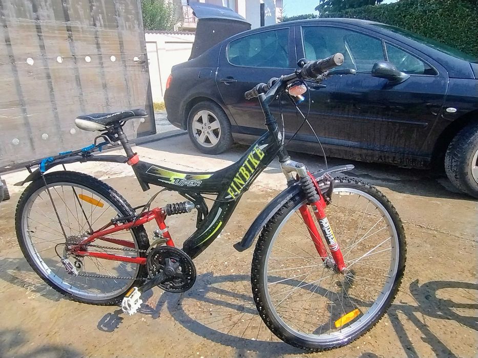 Bicicleta  adult și copil