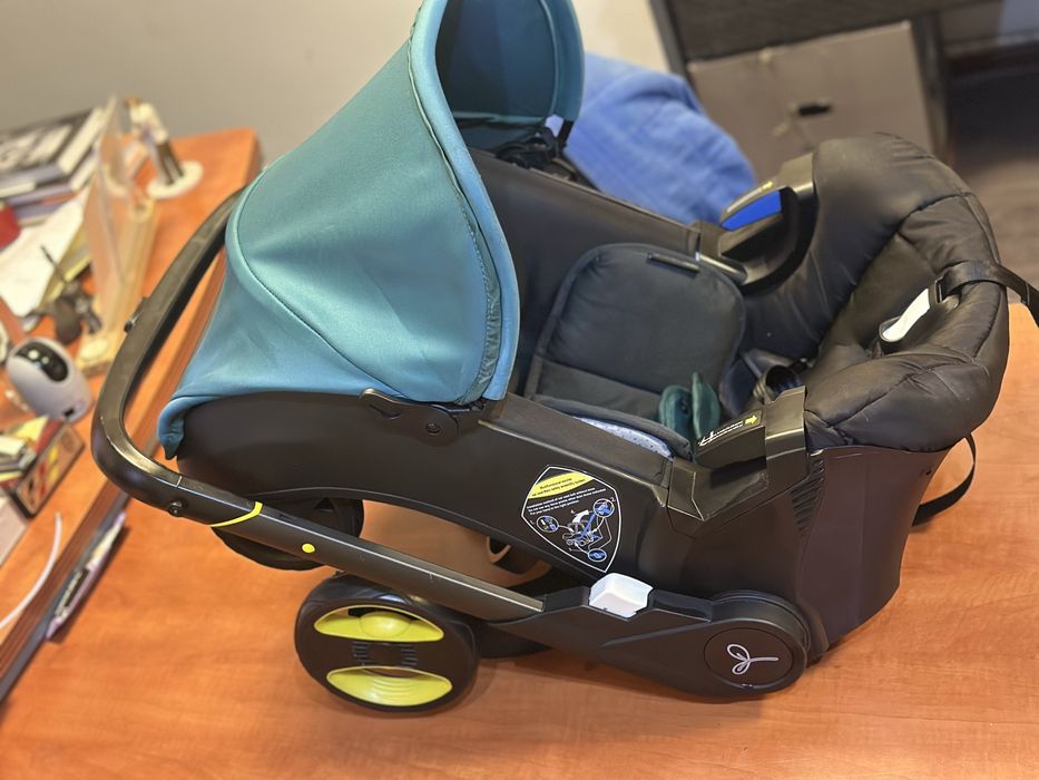 детское автокресло-коляска Doona