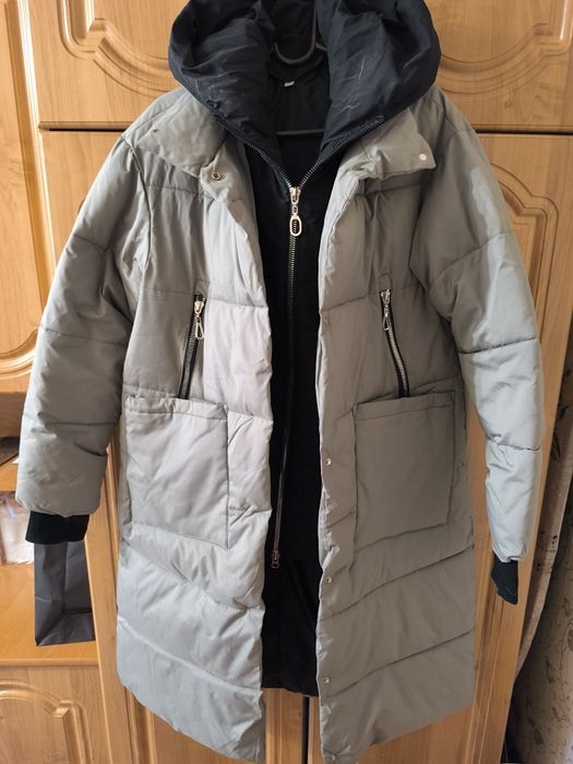 Продам пуховик женский