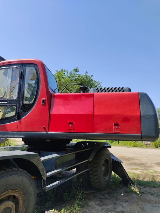 Продам колесный экскаватор