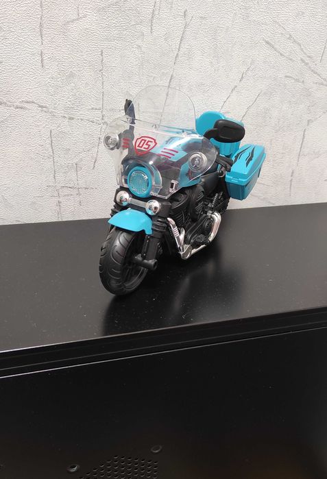 Игрушка-мотоцикл музыкальный