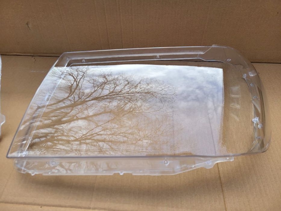 Стекло фары Land Cruiser 100