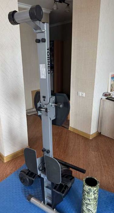 Exercise Machine with weights, mats, and roller