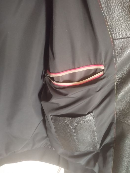 Новая кожаная куртка.