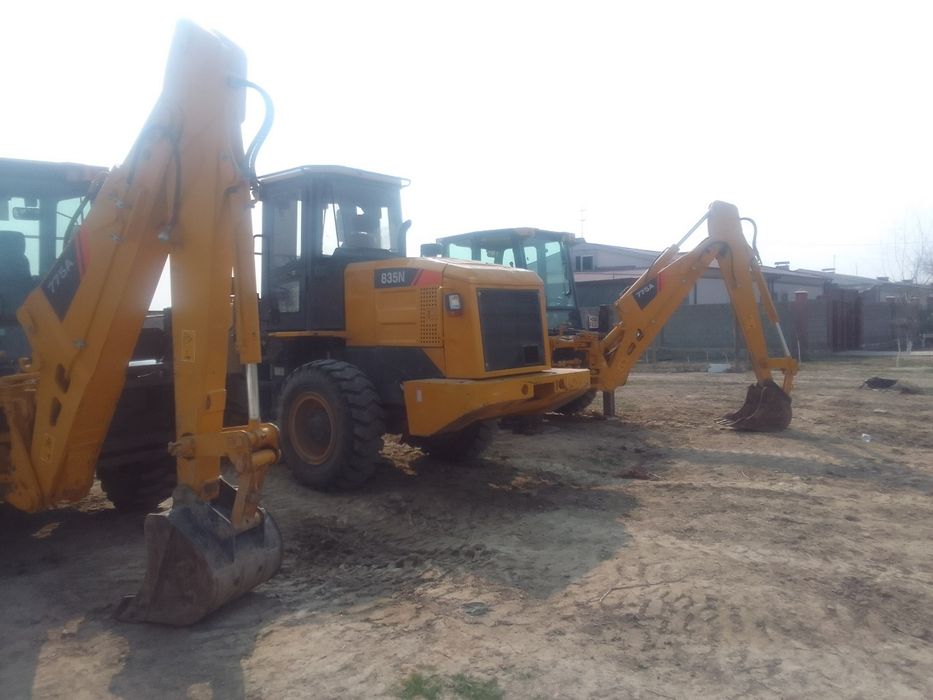 Экскаватор гусиничний. Погрузчик 1.8 лик. Трактор погрузчик 2 дона