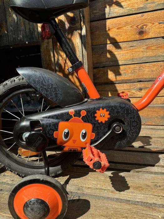 Детски велосипед с помощни колела