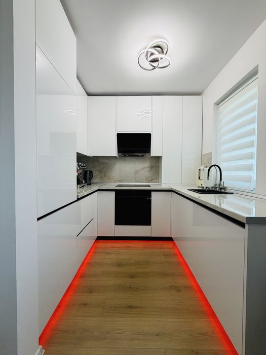 Apartament 2 camere + grădină proprie 70 mp + 2 locuri de parcare