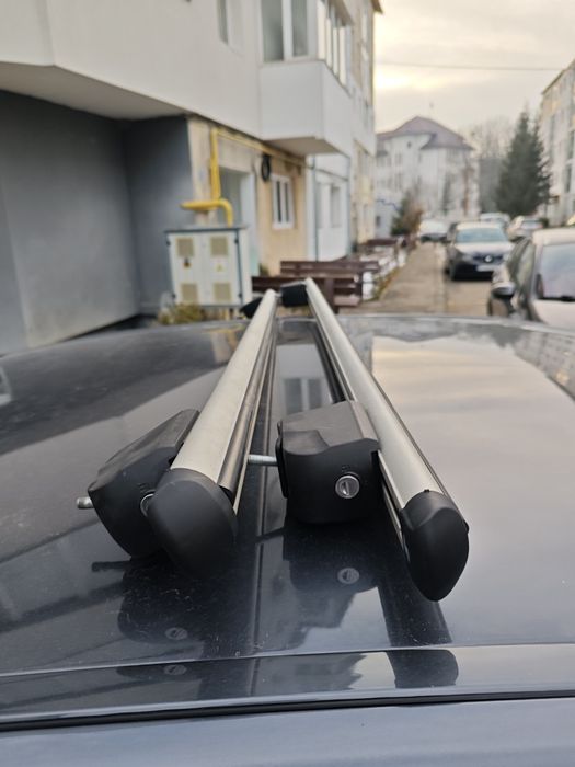 Bare transversale portbagaj universale cu prindere in punct fix