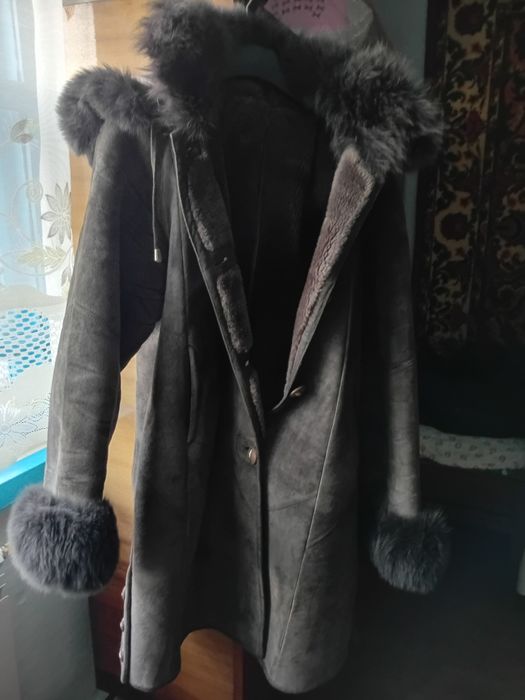 Дубленки с натуральным мехом.