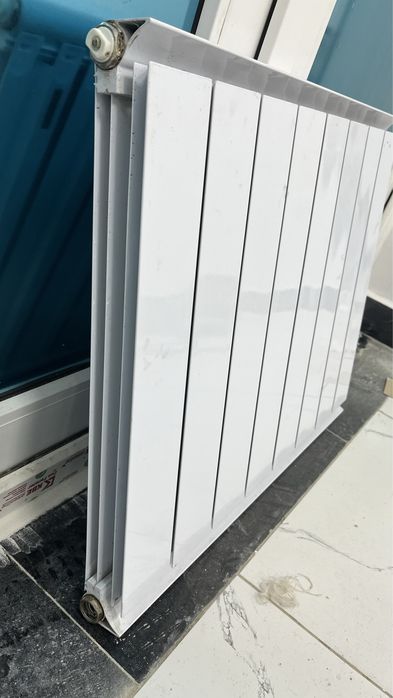 Радиатор отопления батарей