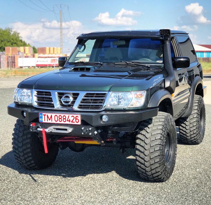 Bara fata Nissan Patrol Y61 cu suport de troliu
