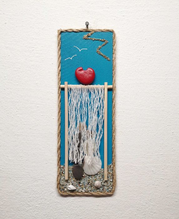 Ръчно изработен сватбен подарък от пясък, камъчета и раковини