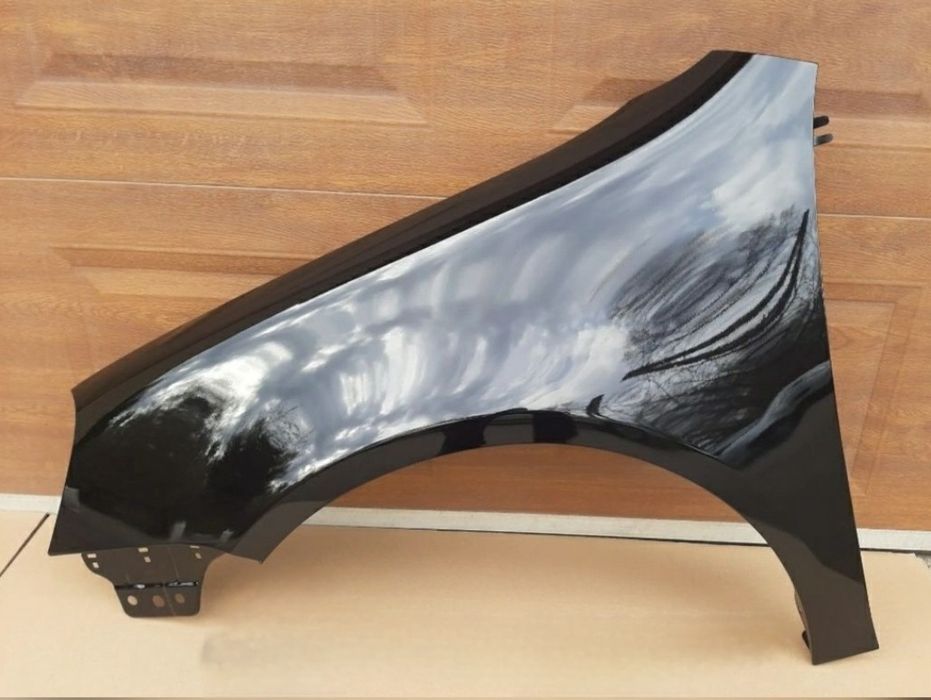 Aripa stanga fata vopsita negru cod vopsea LC9Z VW Golf 5 V 2003 -2009