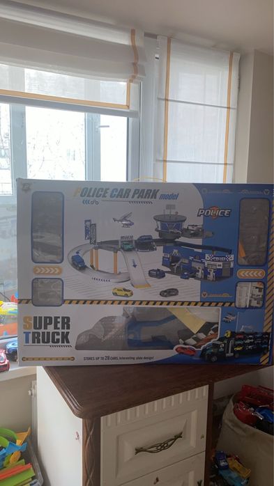 Паркинг с машинами 25000тг