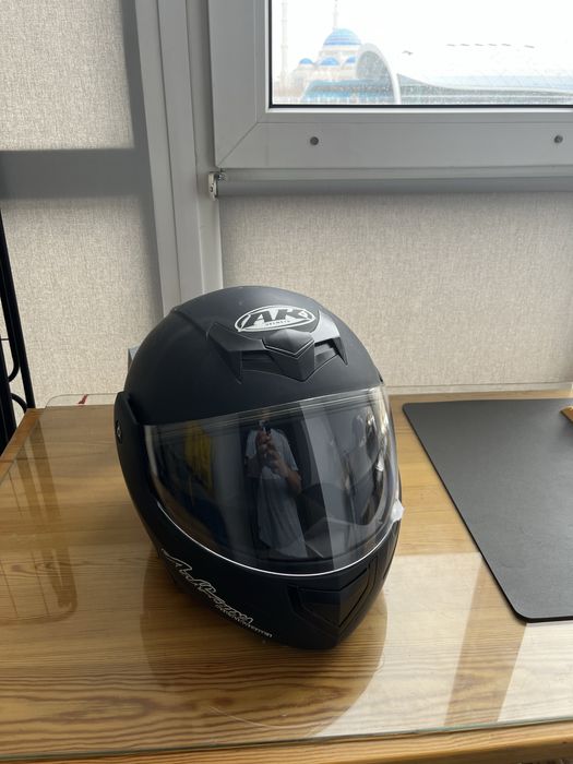 Продам мотошлем новый