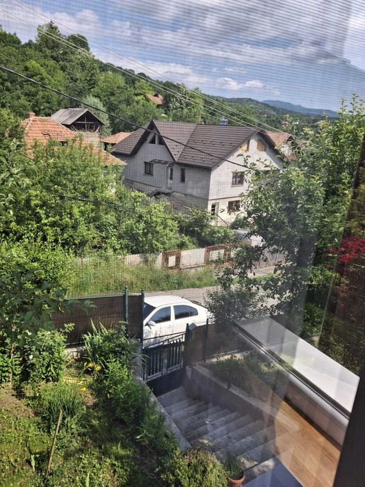 Casa 5 camere, util 122 mp, beci, garaj. 1.200 mp intravilan cu livada