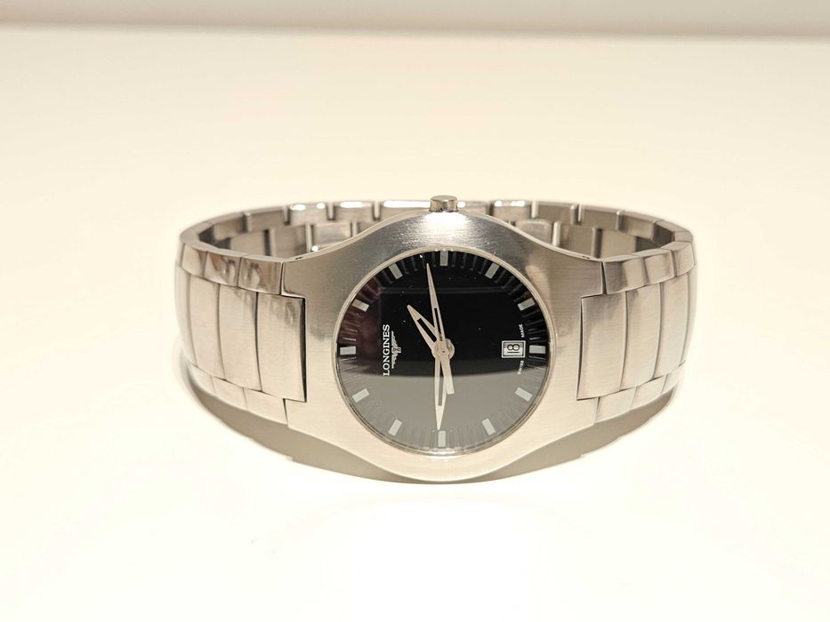 Продаван елегантен стомана кварц мъжки  дамски часовник"Longines"