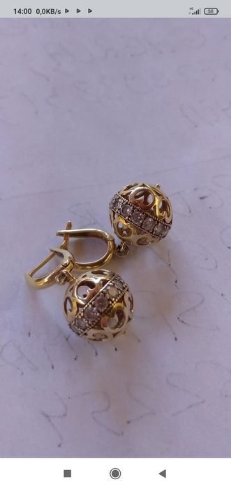 Cercei din aur galben.