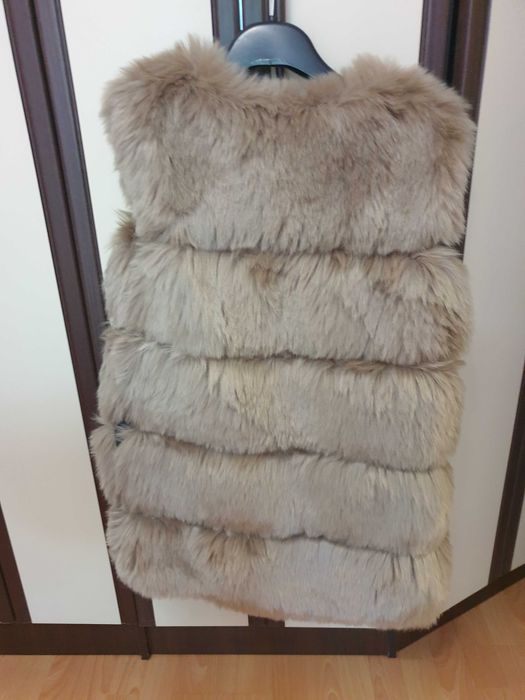 Дамски луксозен пухен елек