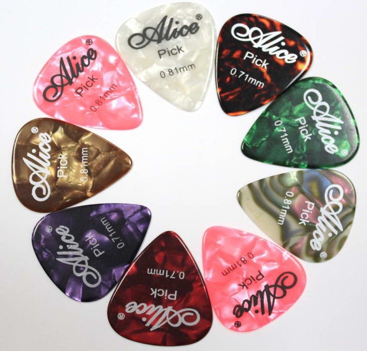 Медиаторы для игры на гитаре. Ремни для гитар.