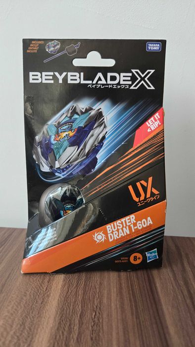 Beyblade X - Buster Dran 1-60A + Lansator (UX) (Sigilat, Original)