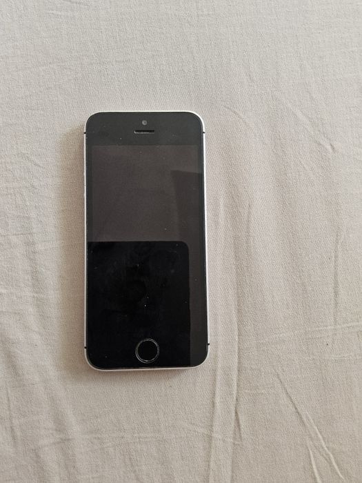 Iphone se 32gb, baterie 89%, touchid nu fuctioneaza, neverlocked